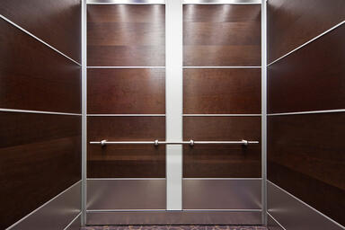 LEVELe-107 Elevator Interior with Capture panels in American Cherry 