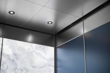 Elevator Ceiling in Stainless Steel with Seastone finish shown in LEVELe-106 