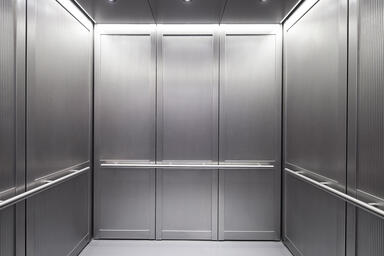 LEVELc-2000N Elevator Interior with inset panels in Stainless Steel