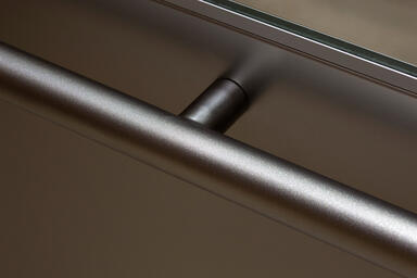 Sextant Handrail in Stippled Stainless Steel shown in LEVELc-2000N