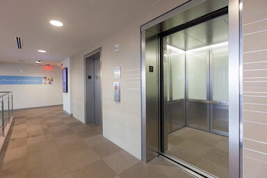LEVELc-2000N Elevator Interiors with panels in ViviGraphix Graphica glass