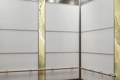 LEVELe-107 Elevator Interior with main panels in ViviChrome Chromis glass 